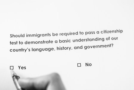 Poll question: Should immigrants be required to pass a citizenship test to demonstrate a basic understanding of our country's language, history, and government? Answer: Yesの写真素材