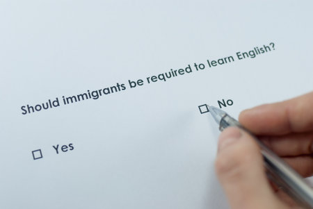 Poll question: Should immigrants be required to learn English? Answer: No.の写真素材