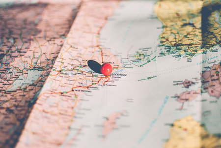 Closeup of a traveler's road map in vintage retro colors. Stockholm, capital of Swedenの写真素材