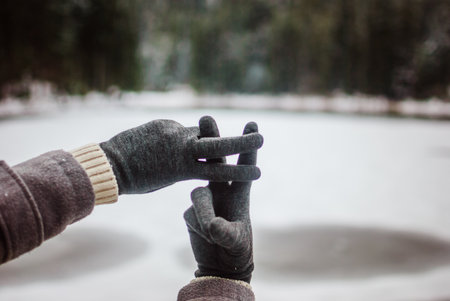 Tender girl's pale hands making a hashtag gesture. Close-up. Concept (idea) of the Internet, social media, networking, communication, social networking addiction.の写真素材