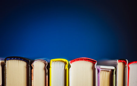Colorful books on the table. Closeup of counterfoils. Abstract concept of knowledge, education,...
