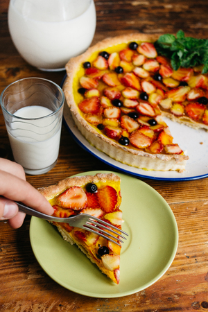 Pie strawberries, blueberries and blackberries. Picture for the menu or confectionery catalog. Milkの写真素材
