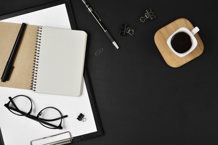 Flat lay, top view office table desk. Workspace with blank clip board, office supplies, pen,...