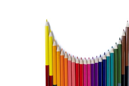 School concept. Closeup images of many color pencils isolated on white background. Flat lay, top view, copy space.の写真素材