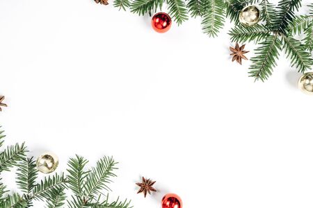 Christmas handmade gift boxes decorated with craft paper and branch on white background. Christmas, winter, new year concept. Flat lay, top view, copy spaceの写真素材