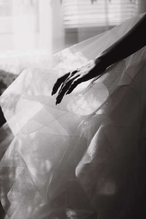 Closeup black and white photo of elegant and beautiful bride hand. Wedding detailsの写真素材