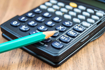 Calculator and pencilの写真素材
