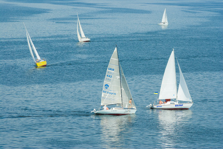 Dnepropetrovsk, Ukraine - May 29, 2010: Turn of the sailing race on the Dnepr river during city yacht club championshipのeditorial素材