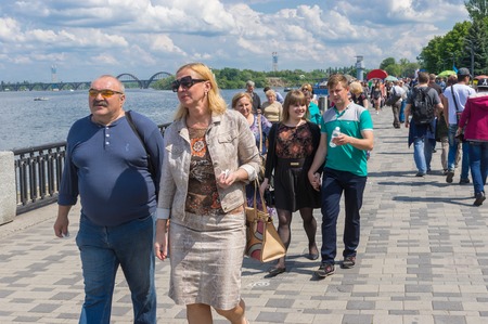 DNEPROPETROVSK, UKRAINE - May 09, 2016:People walking on the Dnepr river embankment during Victory Day celebrations at May 09, 2016 in Dnepropetrovsk, Ukraineのeditorial素材