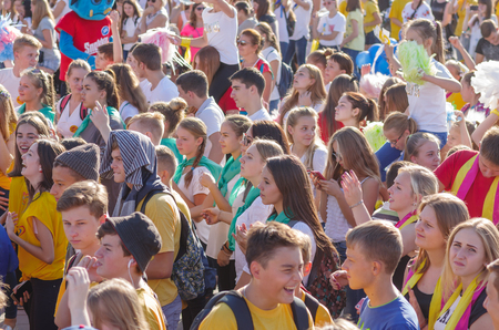 DNEPR, UKRAINE - SEPTEMBER 10, 2016:Young people faces with positive emotions while listen music on the Dnepr river embankment during City Day local activityのeditorial素材