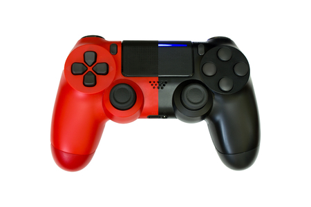 Gaming concept. Red and black joysticks on yellow background.