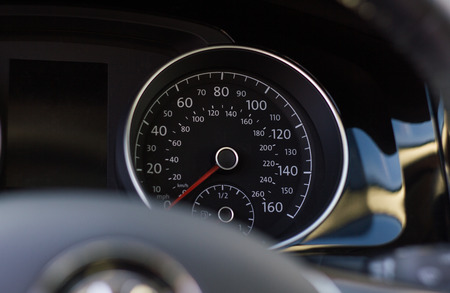 Modern car speedometer. Close up shot of the dashboard a car.