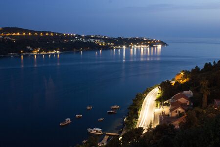 Night scene at Spit bay in Croatia. Long exposure. Famous european travel resort on Adriatic Sea.の写真素材