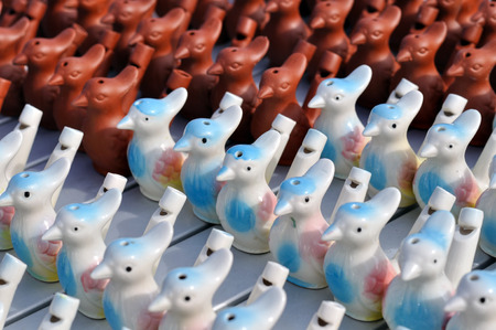 sets of  whistles,  ceramic souvenirs for childrenの写真素材