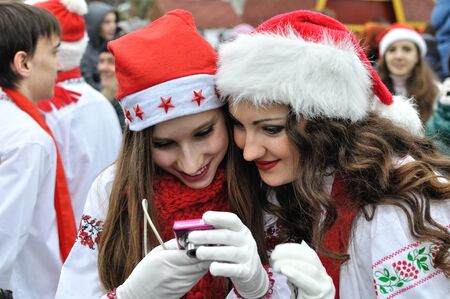 Cherkasy, Ukraine,January,14, 2014: Group of teenagers  dressed as Santa Claus took part in the city Christmas festivalのeditorial素材