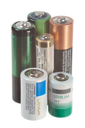 Different size batteries isolated on white