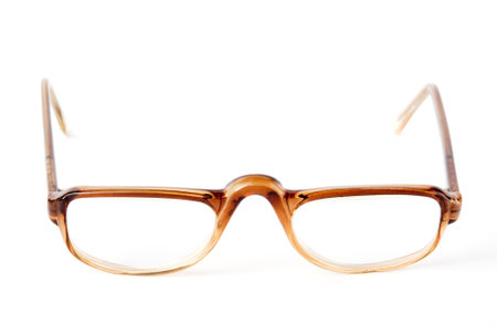 Old eyeglasses isolated on the white backgroundの写真素材