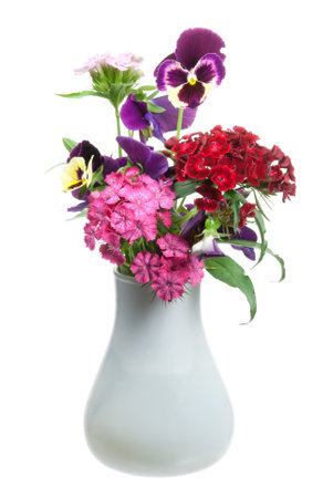 Bunch of flowers in a vase isolated on whiteの写真素材