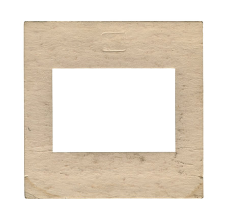Old paper slide film mount frame on whiteの写真素材