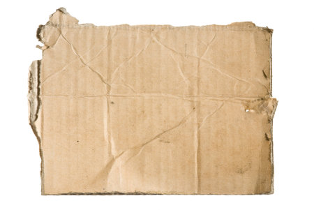 A piece of old cardboard on whiteの写真素材