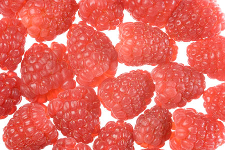 Fresh red ripe raspberries isolated on white