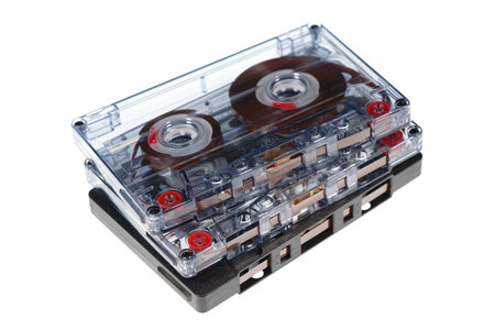 Stack of retro audio cassettes isolated on white background, 80's music conceptの写真素材