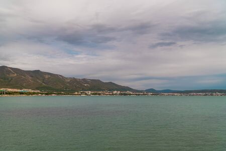 View of the southern resort town of Gelendzhik against the mountains.の写真素材