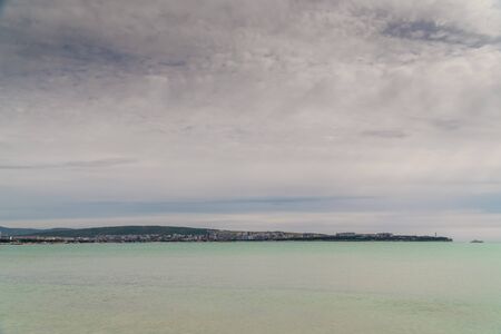 View of the southern resort town of Gelendzhik against the mountains.の写真素材