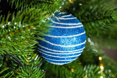 Christmas holiday decorations and toys on home Christmas tree.の写真素材