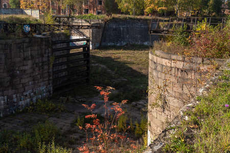 Russia. Kronshtadt. Picturesque autumn views of the historic Petrovsky dock in Kronstadt.のeditorial素材