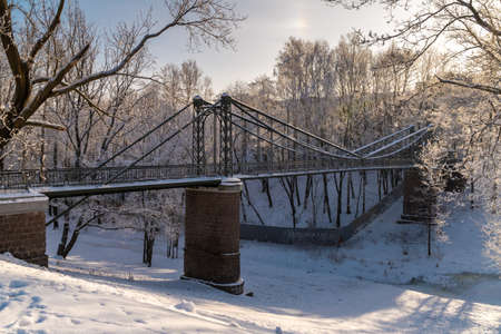 Russia. Winter view of the hanging Makarovsky Bridge over the ravine of the Petrovsky dock in Kronstadt.のeditorial素材