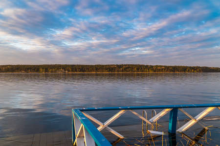 Russia. May 14, 2021. Evening sunset on a warm May evening on Sukhodolsky Lake in the Leningrad region.のeditorial素材