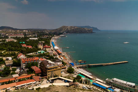 The Republic of Crimea. July 12, 2021. Summer picturesque view of the city of Sudak from the height of the Genoese fortress, located on the Serf mountain.のeditorial素材