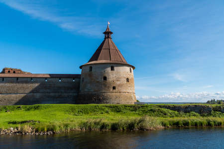 Russia. Leningrad region. September 10, 2021. View of the Golovin Tower in the Oreshek Fortress from the Neva River in sunny weather.のeditorial素材