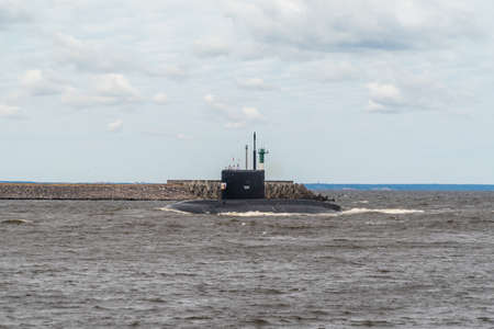Russia. July 25, 2021. Navy Day celebration. The Petropavlovsk-Kamchatsky diesel-electric submarine of Project 636 runs along the fairway along the southern coast of Kronstadt.のeditorial素材