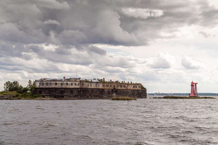 Russia. Saint-Petersburg. August 15, 2021. Fort Kronshlot is a monument of history and architecture of the XVIII century, located along the fairway of the southern coast of Kronstadt.のeditorial素材