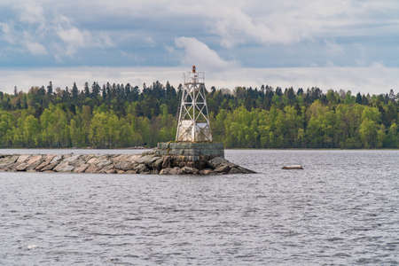 Russia. Leningrad region. May 29, 2022. Lighthouse at the exit to Lake Ladoga from Vladimir Bay.の写真素材