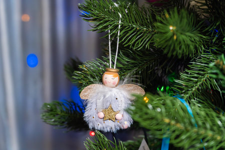 Russia. Kronstadt. January 19, 2023. Festive decoration in the form of a small angel on a Christmas tree.の写真素材