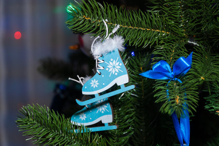 Russia. Kronstadt. January 19, 2023. Festive decoration - small blue skates on the Christmas tree.の写真素材