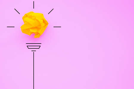 Creativity inspiration, ideas concepts with lightbulb from paper crumpled ball on color background.