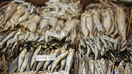 Healthy dried fish display protein-packed trail mixes stall, healthy dried fish display reveals nutrient row with vibrant basket, colorful scene, display moment, great for trail mix nutrition ads.の写真素材