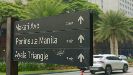 Urban map indicators displayed, vibrant city environment featuring navigation graphics and landmark...