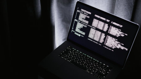 Focused programmer late at night, Remote IT developer working amidst soft light glow, Freelance IT...