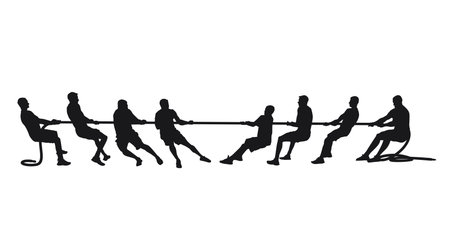 silhouette of a group of men competing in a tug of war vector illustrationのイラスト素材