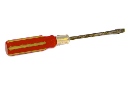 Old isolated red screwdriver on white background. Old rusty screwdriver.の写真素材
