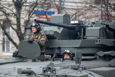Moscow Russia - may 09 2022: Victory Day parade. Russian soldiers are riding on a tank in Moscow.