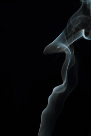 Abstract white smoke texture on black background Plume of smoke wave design wallpaperの写真素材