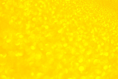 golden glitter christmas abstract background. defocused golden lights.の写真素材