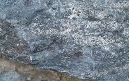 Granite stone texture background. Close up of natural stone.