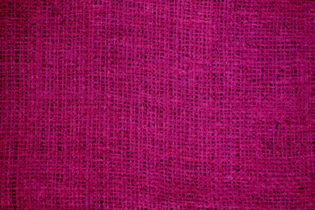 pink burlap texture useful as a background - retro vintage effectの写真素材